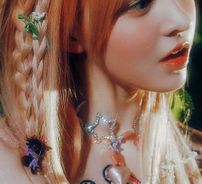 Foto de LILY (NMIXX)