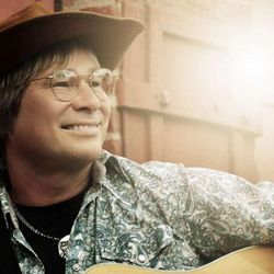 Letra da música Sunshine on my shoulders - John Denver