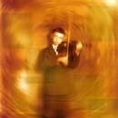 Is A Woman - 2002 • Álbum