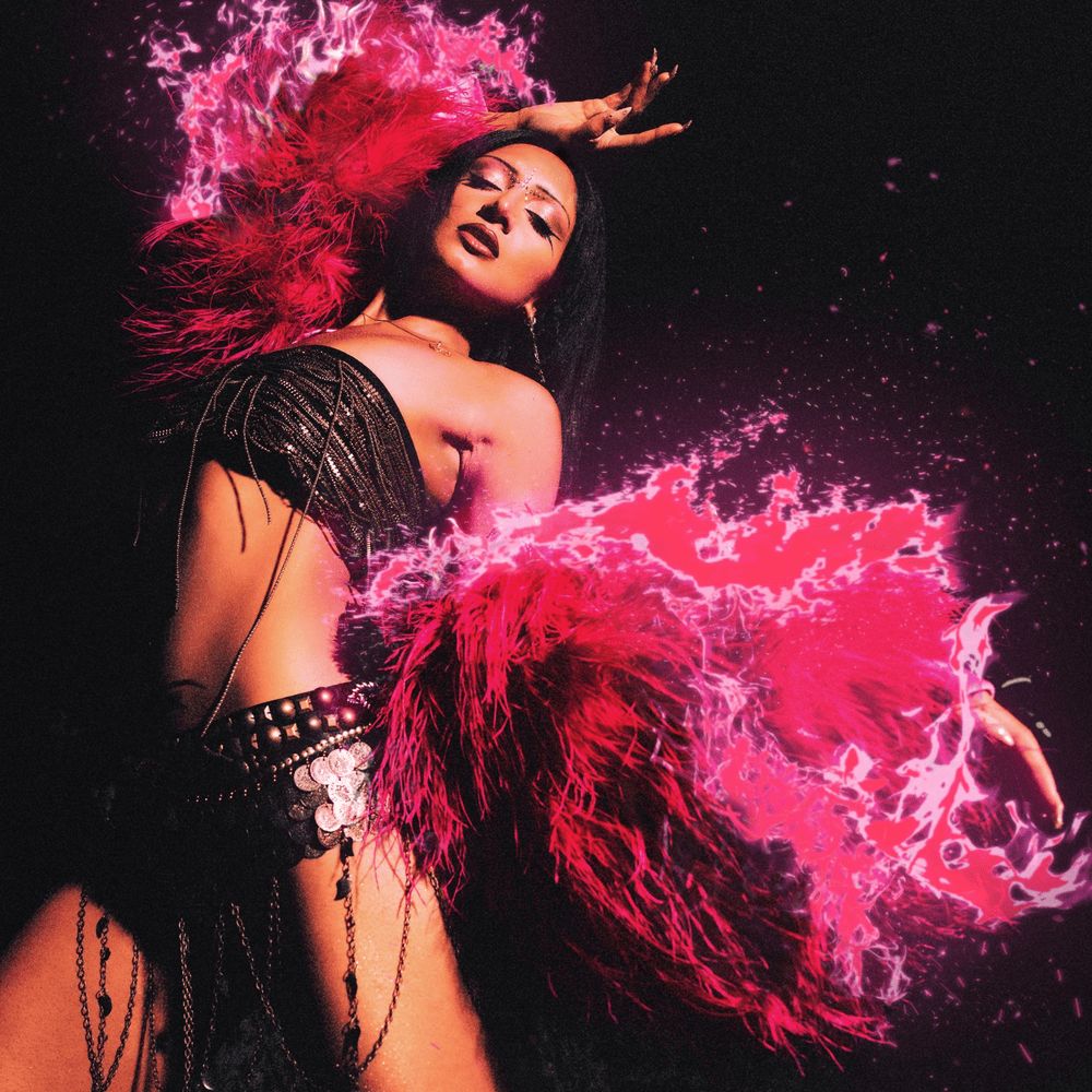 Portada de la canción "Commotion", de Rhea Raj