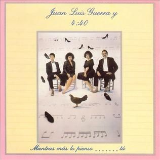 Portada de la canción "Me Enamoro De Ella", de Juan Luis Guerra 4.40