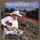 Portada de la canción "Farther Along", de Brad Paisley