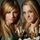 Portada de la canción "Walking On Sunshine", de Aly & AJ