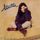 Portada de la canción "Strani Amori", de Laura Pausini