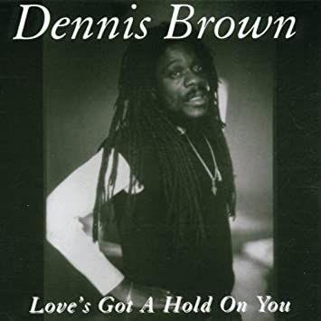Capa do álbum "Love's Got a Hold On You", de Dennis Brown
