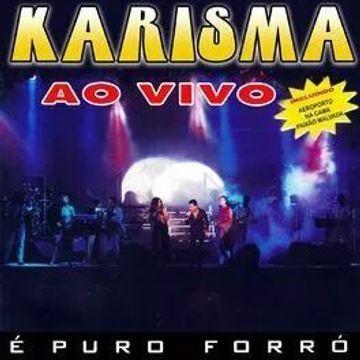 Album cover of "Vol. 4 - É Puro Forró (Ao Vivo)" by Banda Karisma