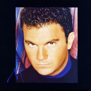 Portada de Álbum "Encadenado", de Manuel Mijares