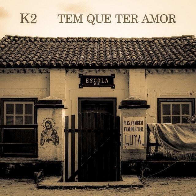 Single/EP cover of "Tem Que Ter Amor (Mas Também Tem Que Ter Luta)" by Banda K2