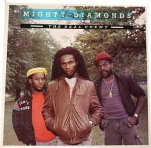 Album cover of "The Real Enemy" by Mighty Diamonds