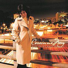 Capa do Álbum "Safe In A Crazy World", de Corrinne May