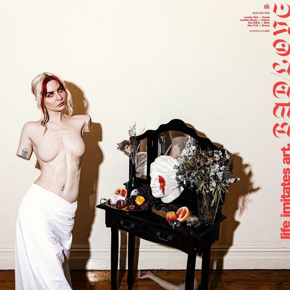 Capa do Álbum "Life Imitates Art", de Bad/Love