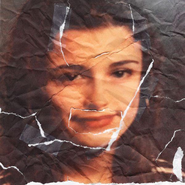 Portada del álbum "Behind Your Back", de Nelly Furtado