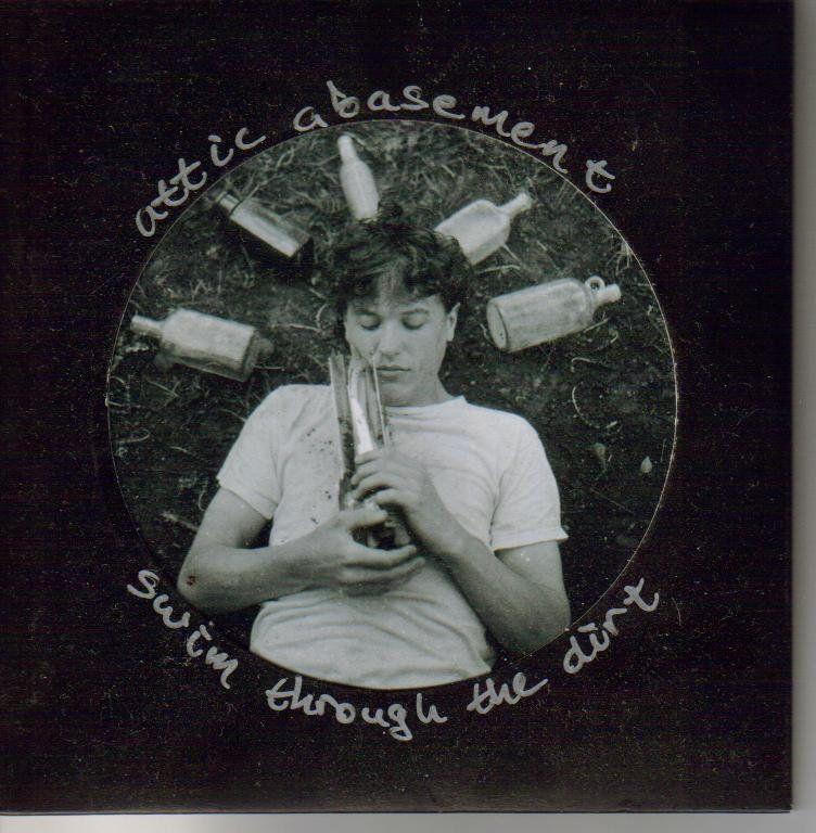 Portada de Álbum "Swim Through The Dirt", de Attic Abasement