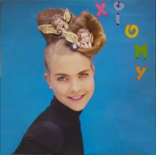 Capa do Álbum "Peinate Cómo Quieras", de Xiomy