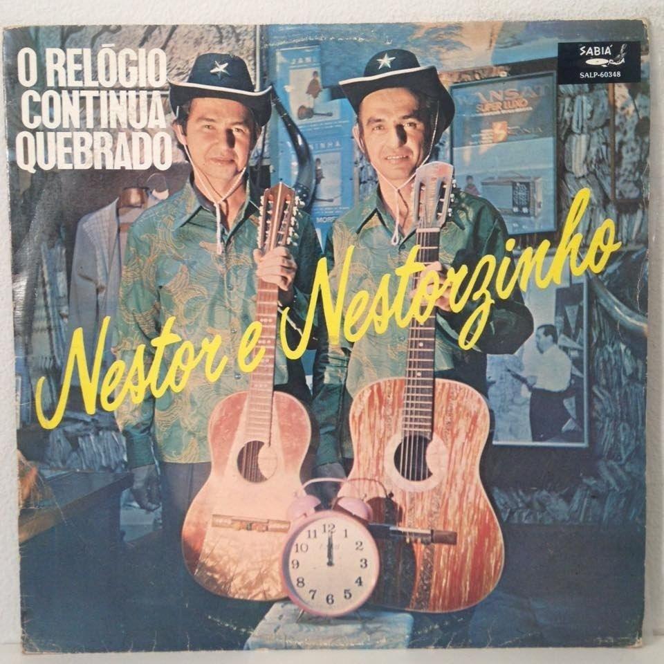 Portada de Álbum "O Relógio Continua Quebrado", de Nestor e Nestorzinho
