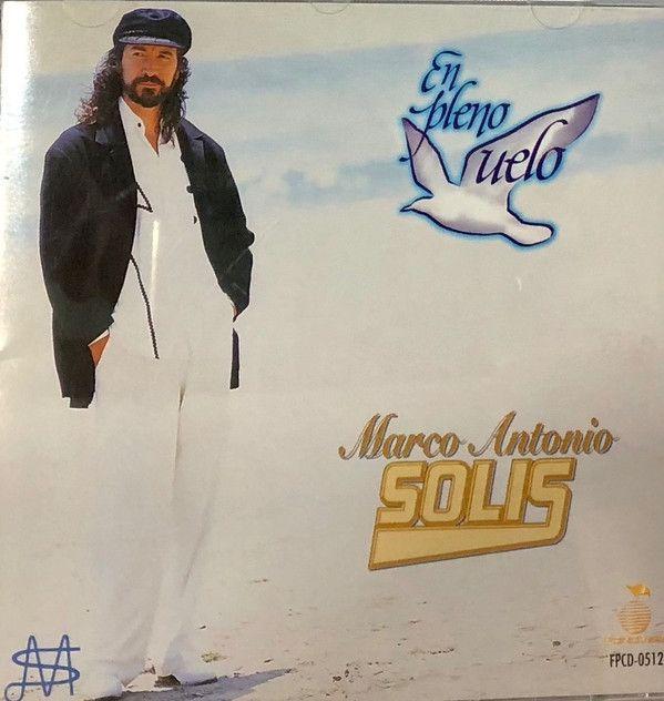 Portada de Álbum "En Pleno Vuelo", de Marco Antonio Solís