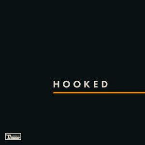 Portada del álbum "Hooked", de Franz Ferdinand