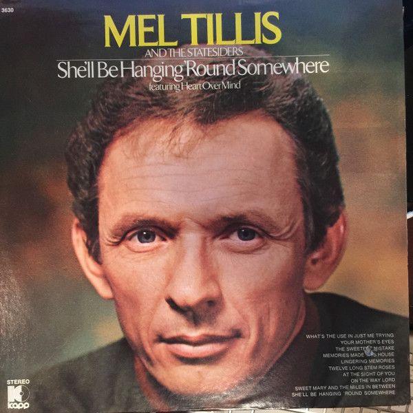 Album cover of "She'll Be Hanging 'Round Somewhere" by Mel Tillis