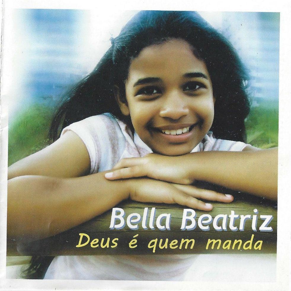 Capa do Álbum "Deus É Quem Manda", de Bella Beatriz
