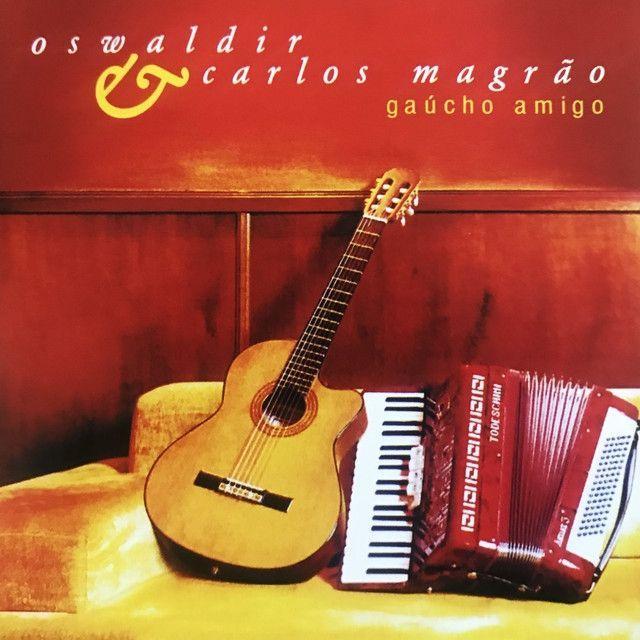 Album cover of "Gaúcho Amigo" by Oswaldir e Carlos Magrão