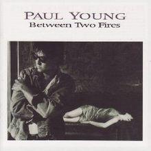 Portada de Álbum "Between Two Fires", de Paul Young