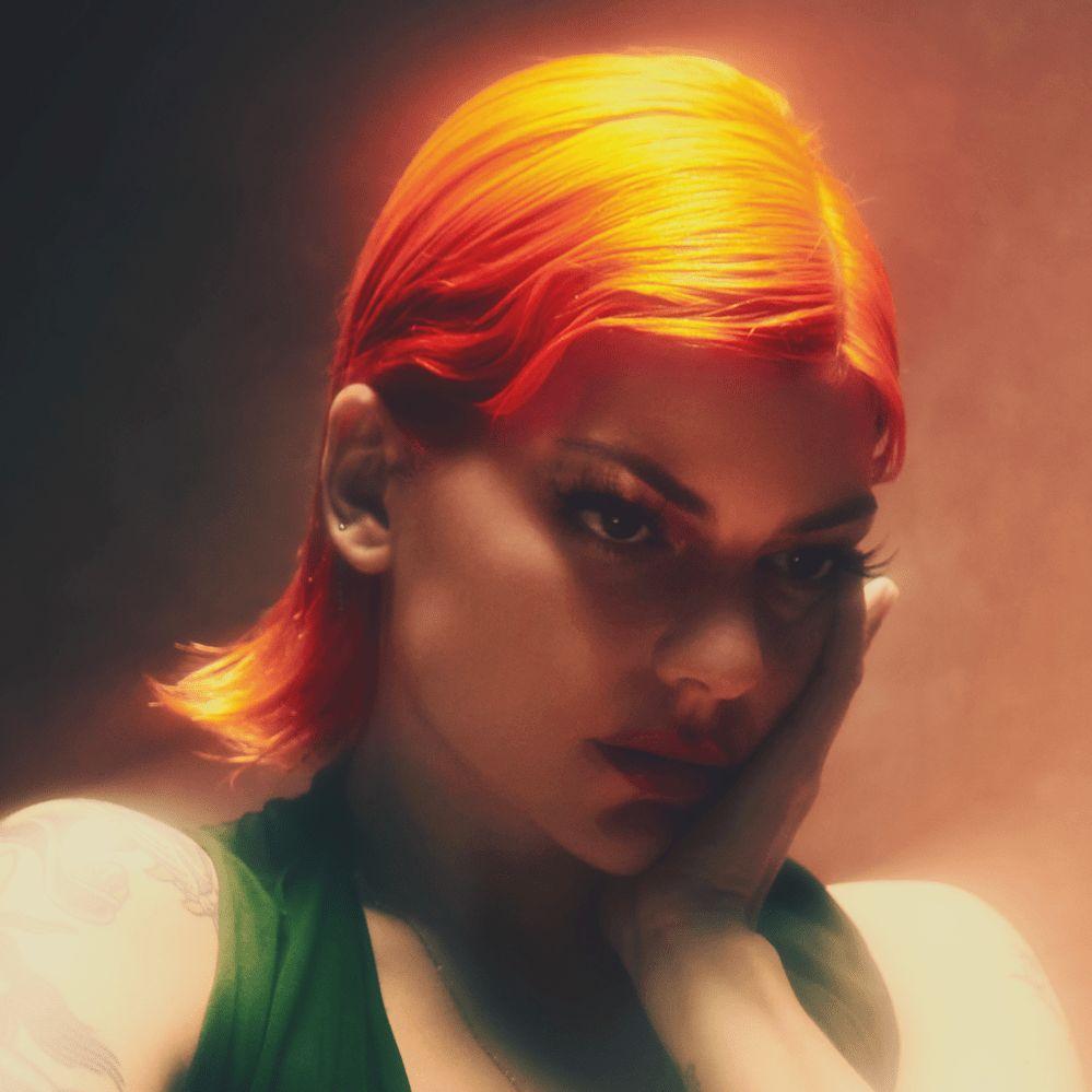 Capa do Álbum "Revel", de Donna Missal