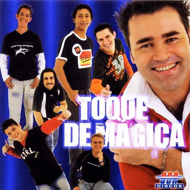 Portada de Álbum "Com Todos Menos Comigo", de Banda Toque de Mágica