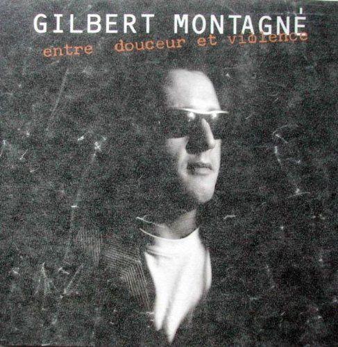 Album cover of "Entre Douceur Et Violence" by Gilbert Montagné