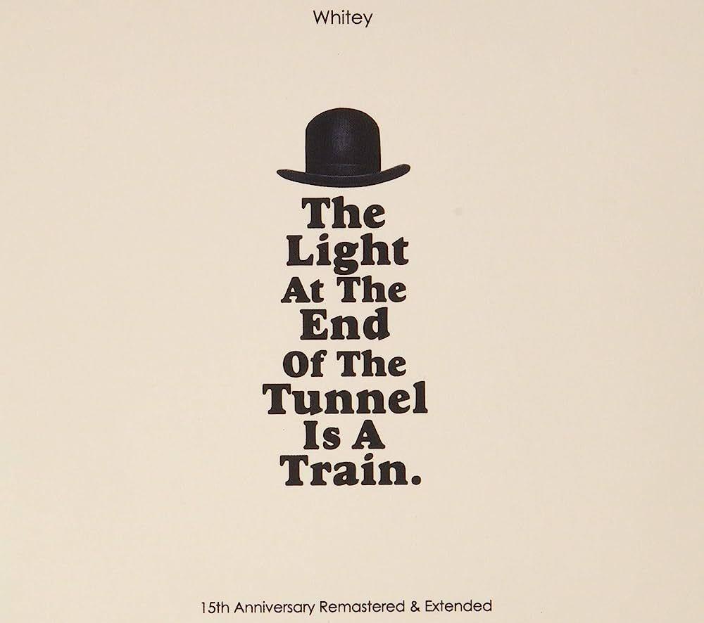 Portada de Álbum "The Light at The End of the Tunnel Is a Train (15th Anniversary Remastered Edition)", de Whitey