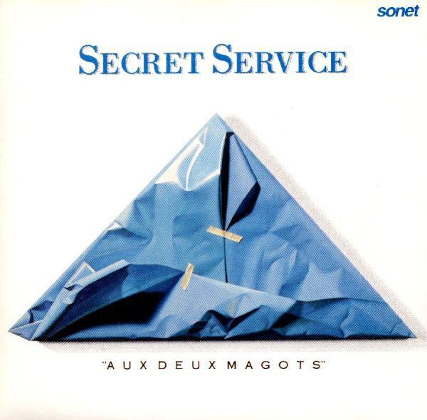 Album cover of "Aux Deux Magots" by Secret Service