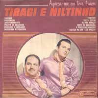 Portada de Álbum "Aqueça-Me Em Teus Braços", de Tibagi e Niltinho