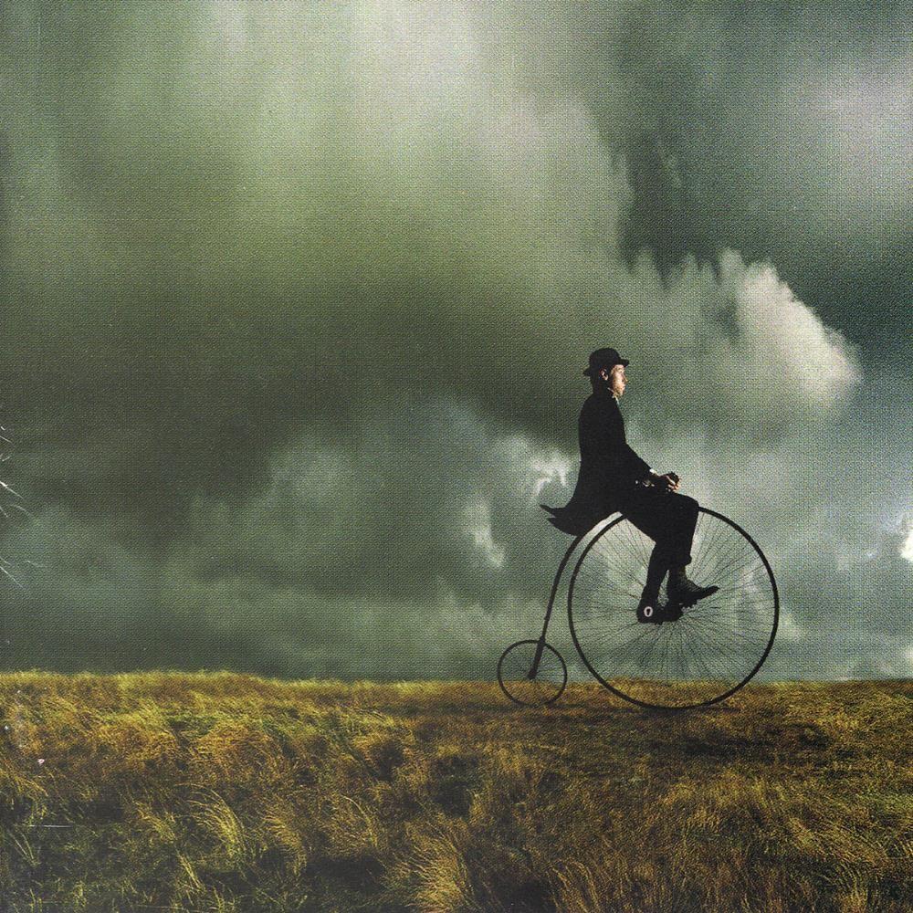 Capa do Álbum "The Visitor", de Arena