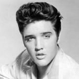 Elvis Presley performing with his signature charisma